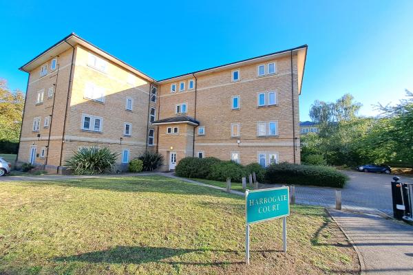 A 4-storey yellow-brick block of flats